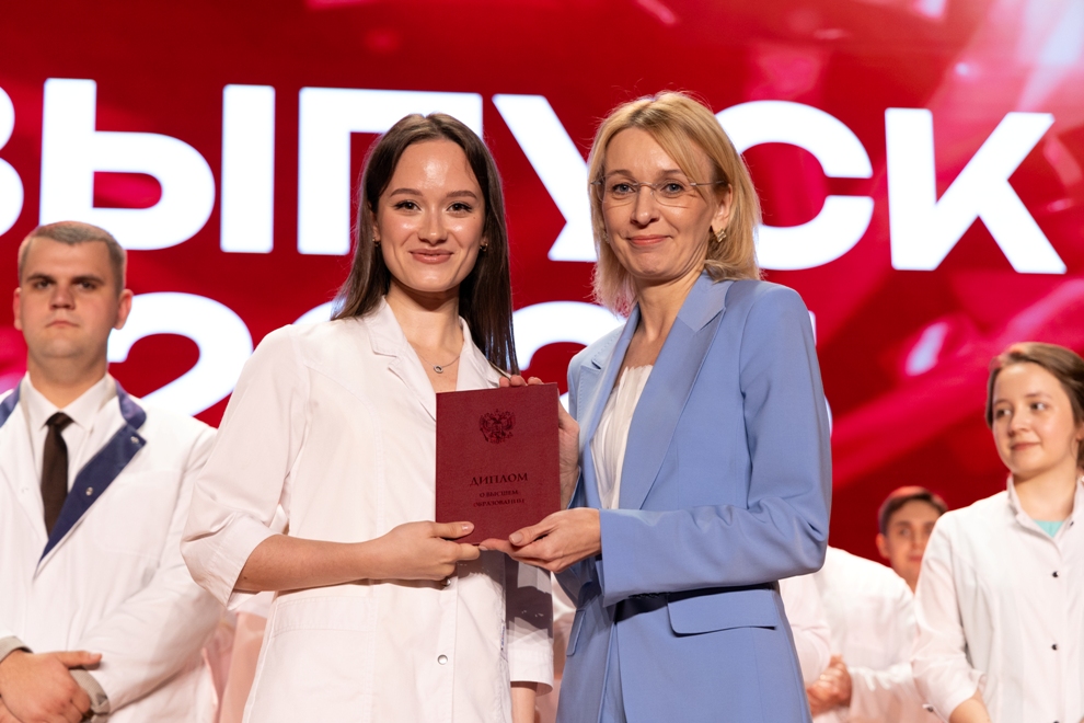 White coats, red diplomas
