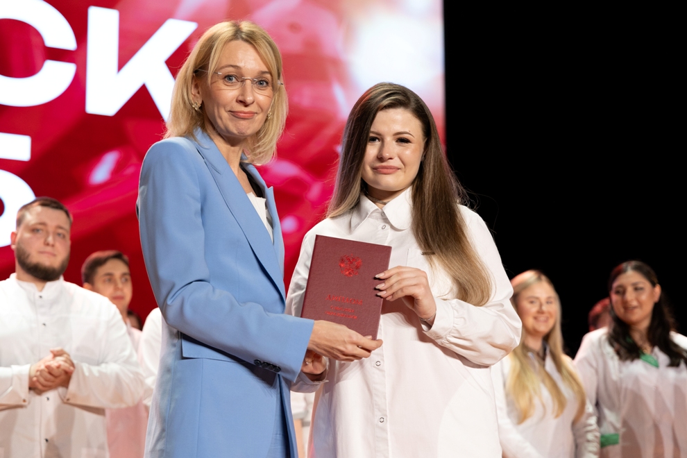 White coats, red diplomas