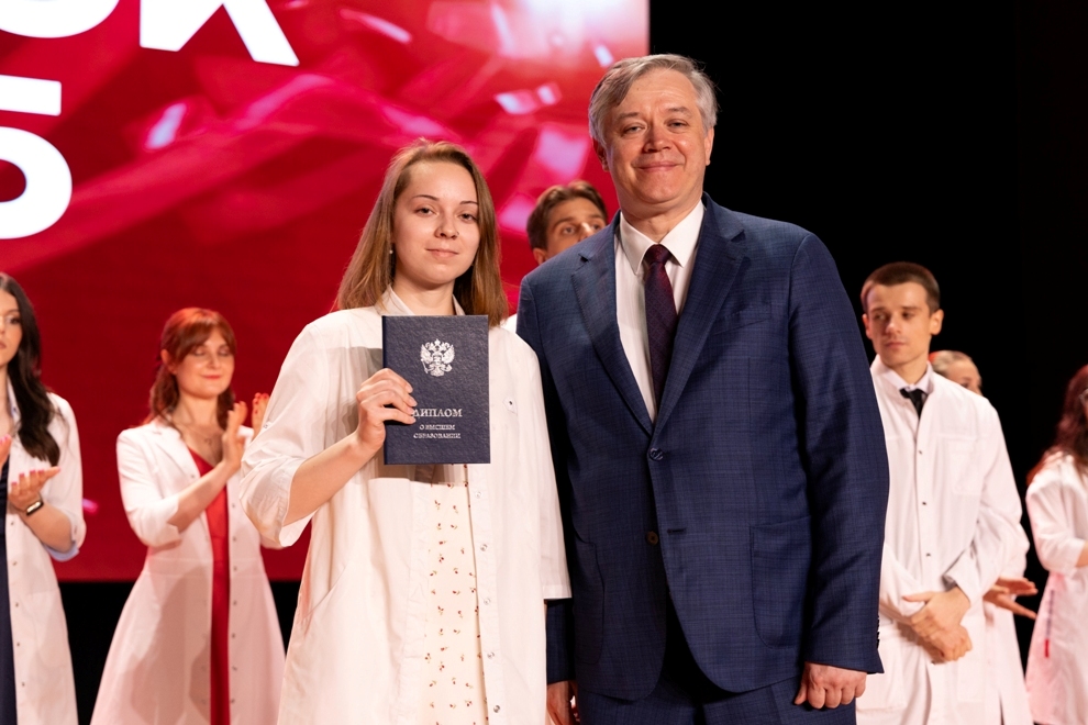 White coats, red diplomas