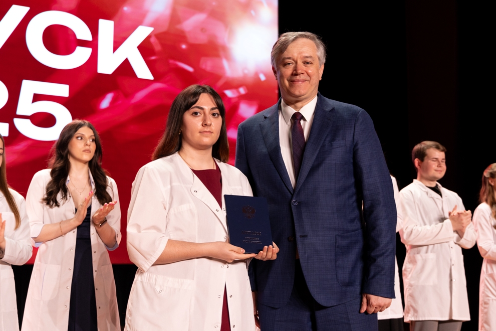White coats, red diplomas