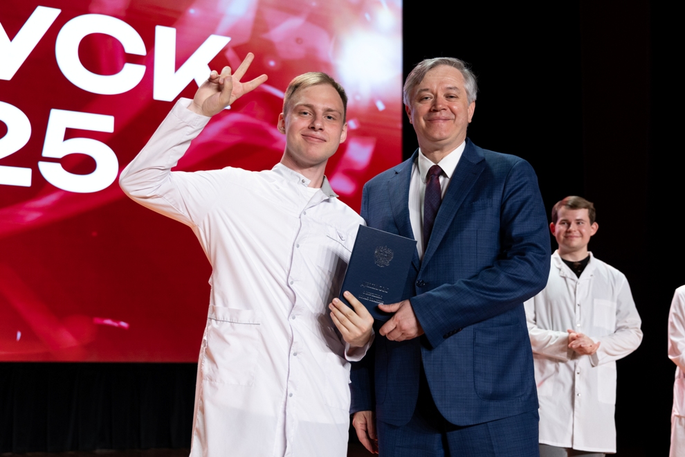 White coats, red diplomas