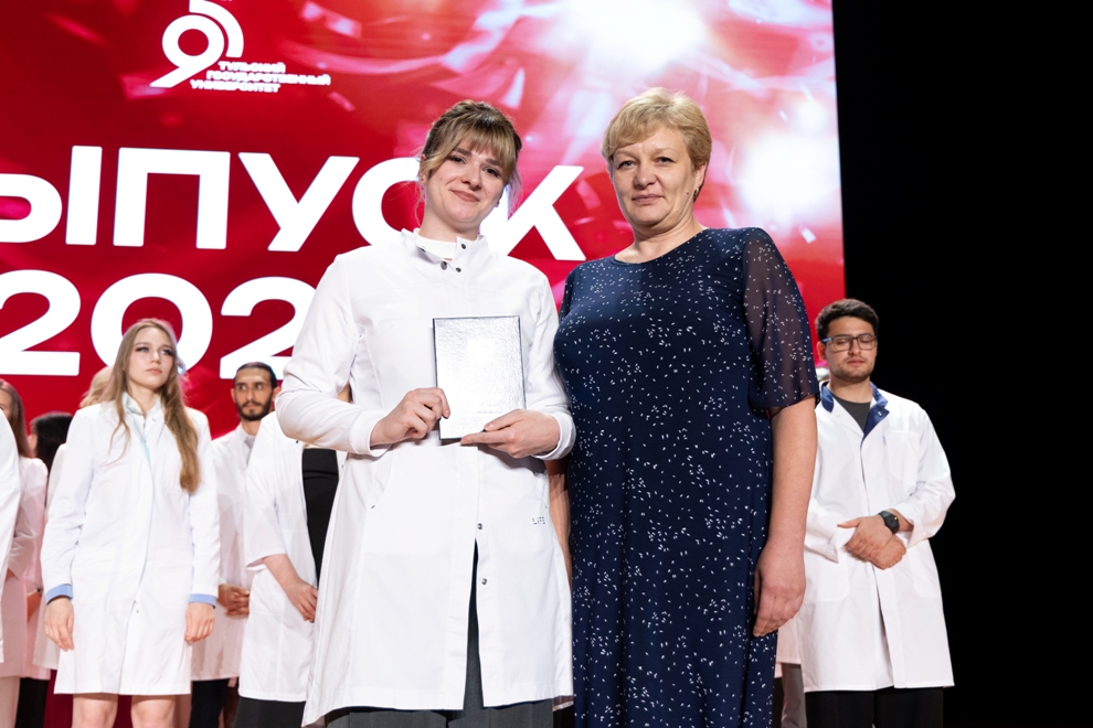 White coats, red diplomas