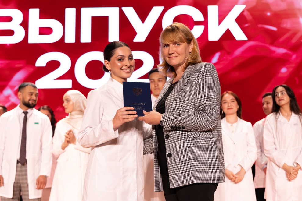 White coats, red diplomas