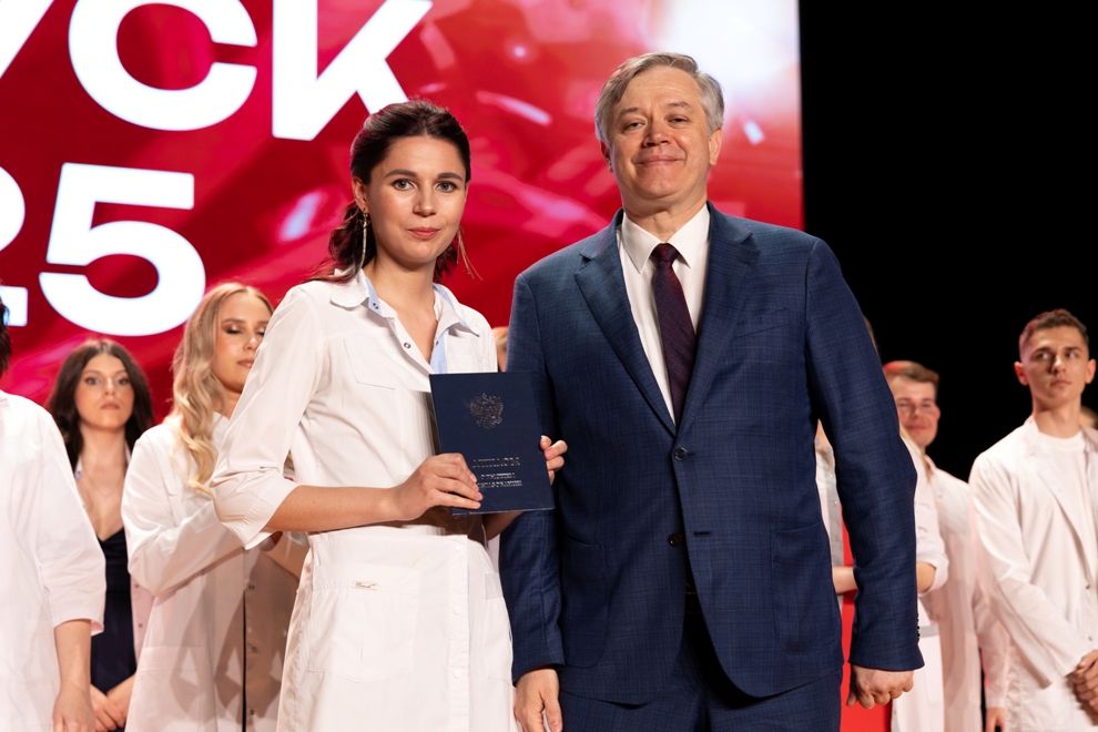White coats, red diplomas