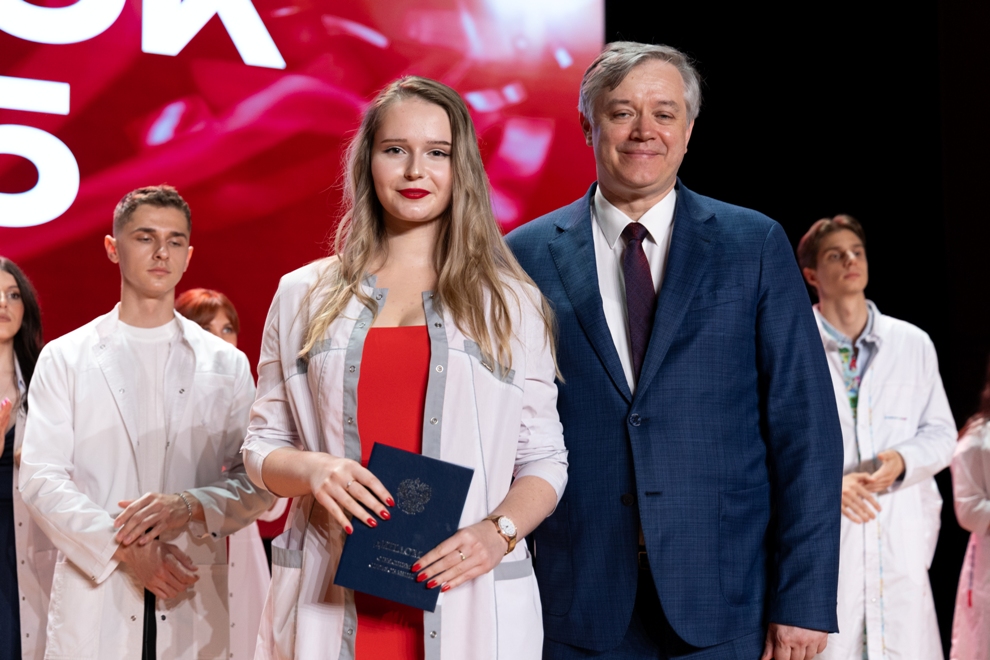 White coats, red diplomas